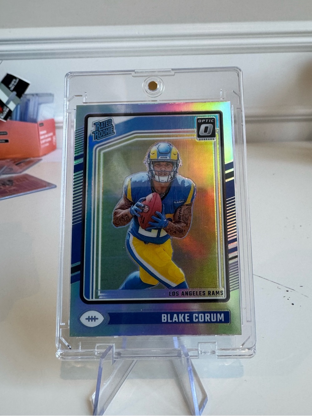 2024 Blake Corum Panini Donruss Optic Silver Prizm Rated Rookie Card.